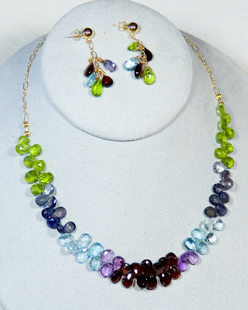 Briolettes of peridot, amethyst, aquamarine, garnet, and iolite on 14k gold chain  $325   earrings $125