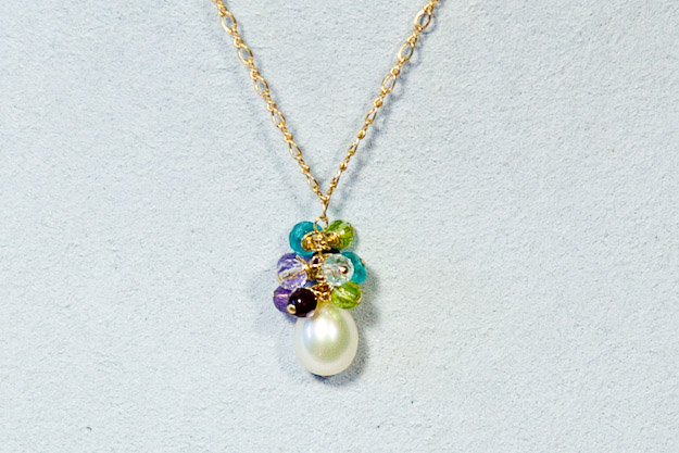 10mm  cultured freshwater pearl with tiny gemstone accents on 14k gold chain   $150