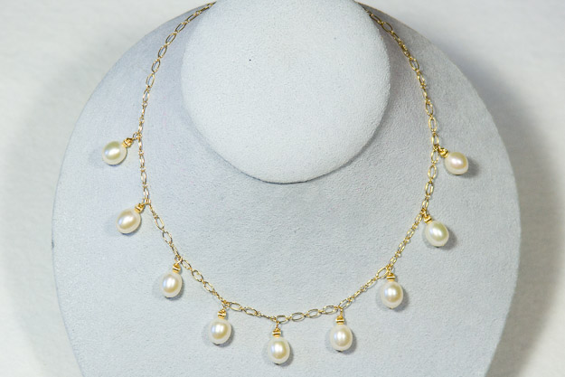 14k gold chain and clasp with 8mm cultured freshwater pearls    $225