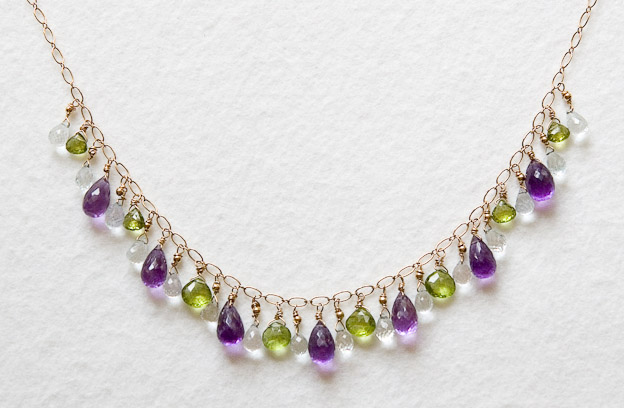 14k gold chain and clasp with tear drops of amethyst, aquamarine, and peridot.     $395