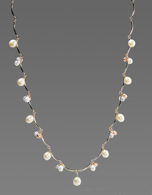 14k gold filled half moon chain with multicolored pearls  $105