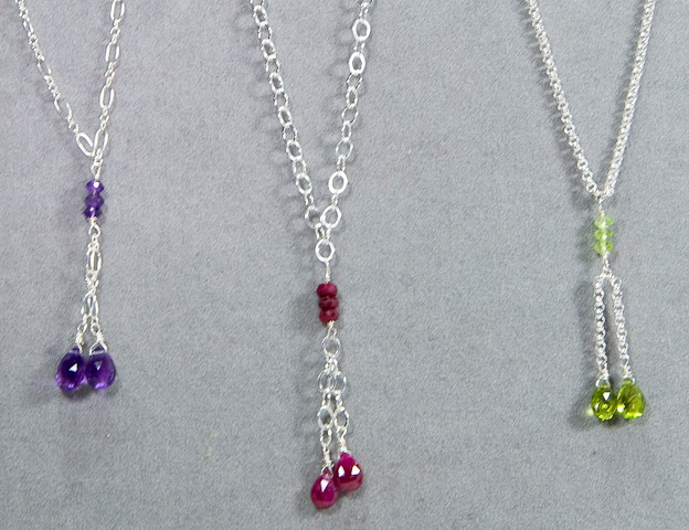 Sterling silver chain with   amethyst or ruby or peridot accents.    $85 each