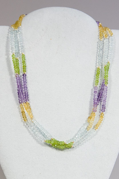 Peridot, amethyst, citrine, and white topaz and 14k gold accents  $225