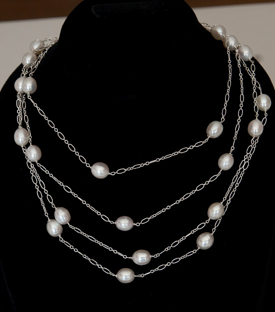Sterling silver chain with cultured freshwater pearls  $150